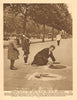 Pavement artist at work under the plane trees on Embankment 1926 old print