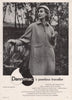 Dannimac's Peerless traveller. Harris tweed. Fashion advert. BRITISH VOGUE 1955