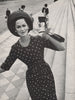 Women's fashion. Polka dot dress. Pram. London fashion. BRITISH VOGUE 1963