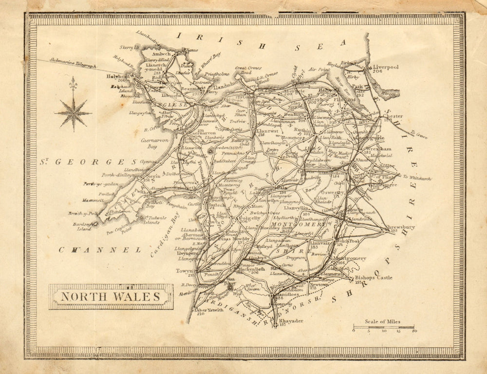 Antique map of North Wales by John Heywood. Railways & coach roads c1864