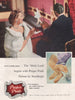 The Mink Look begins with Proper Pride Nylons by Stockleigh. Fashion advert 1955