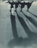 ICE FIGURE SKATING. Four female figure skaters and their shadows, Davos 1935